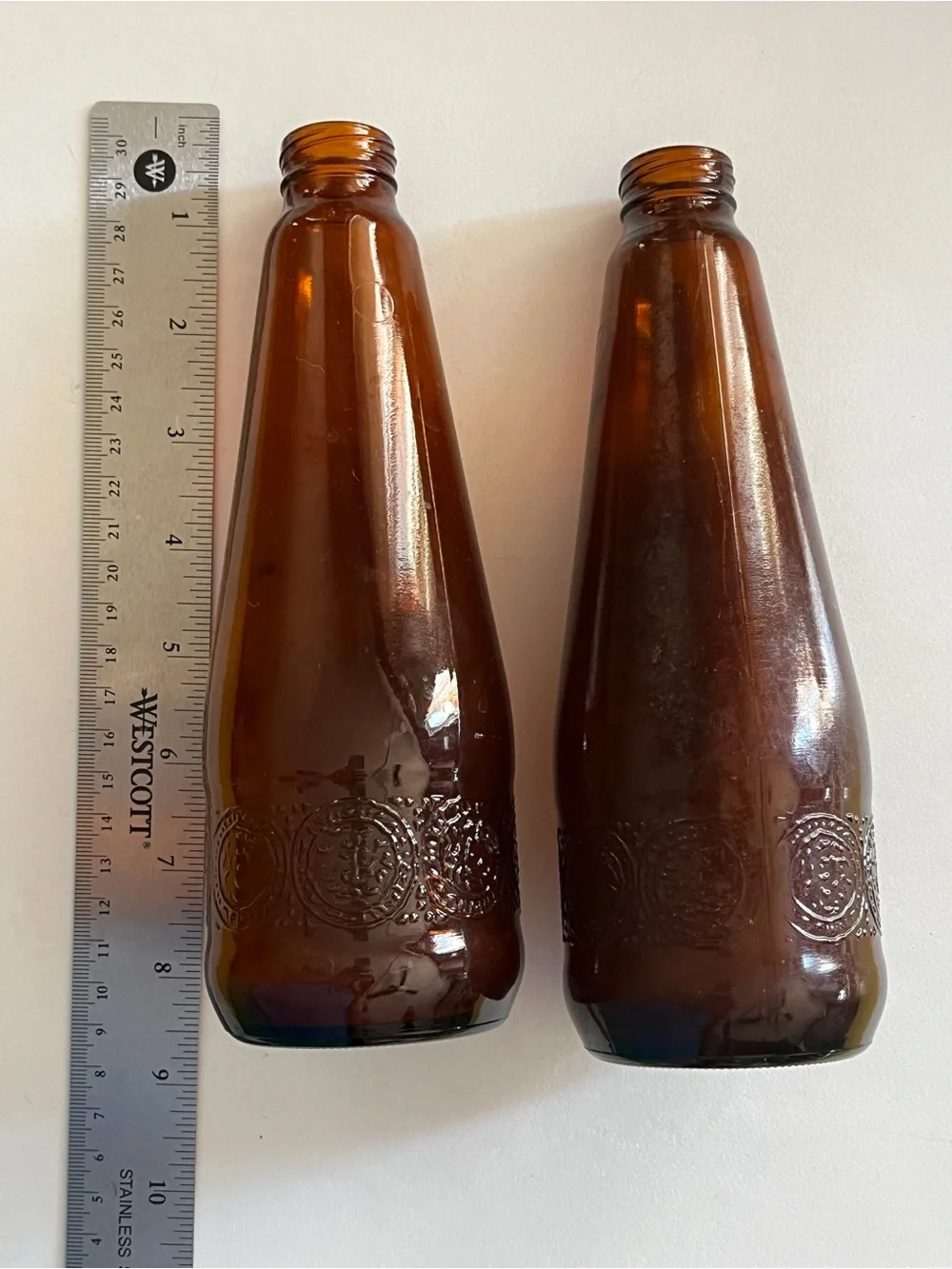 Vintage embossed Brown Amber Glass Decorative Bottles – Set of 2-